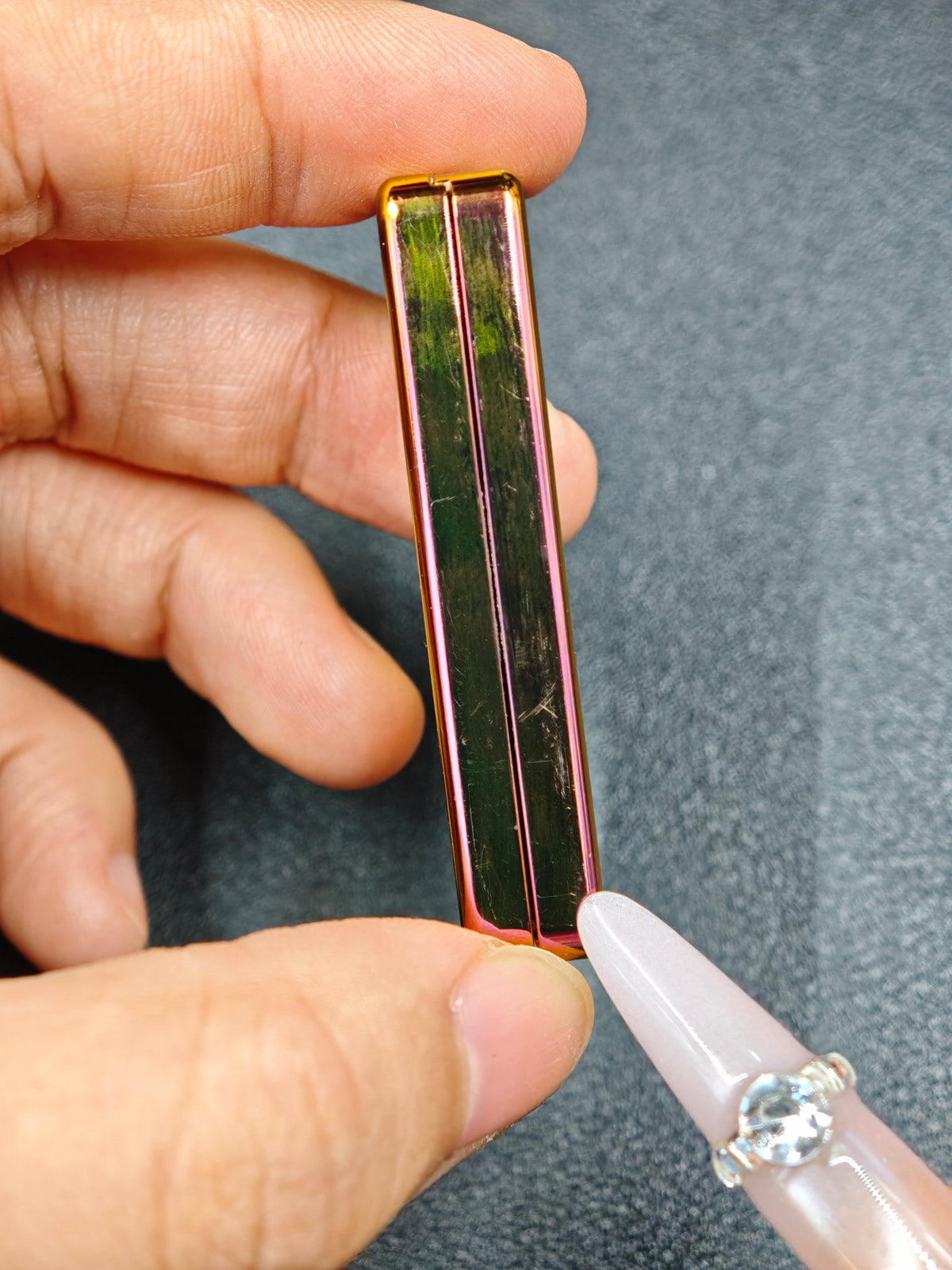 Jingle Bell Zirconium Oil Slick