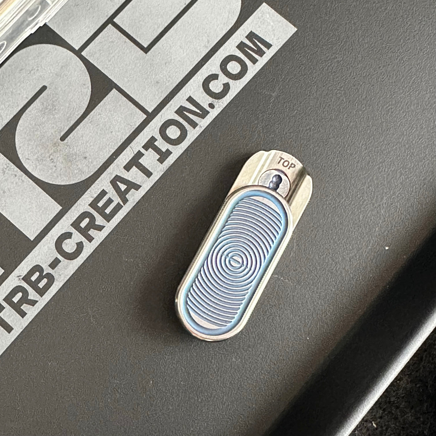 Top-F Titanium