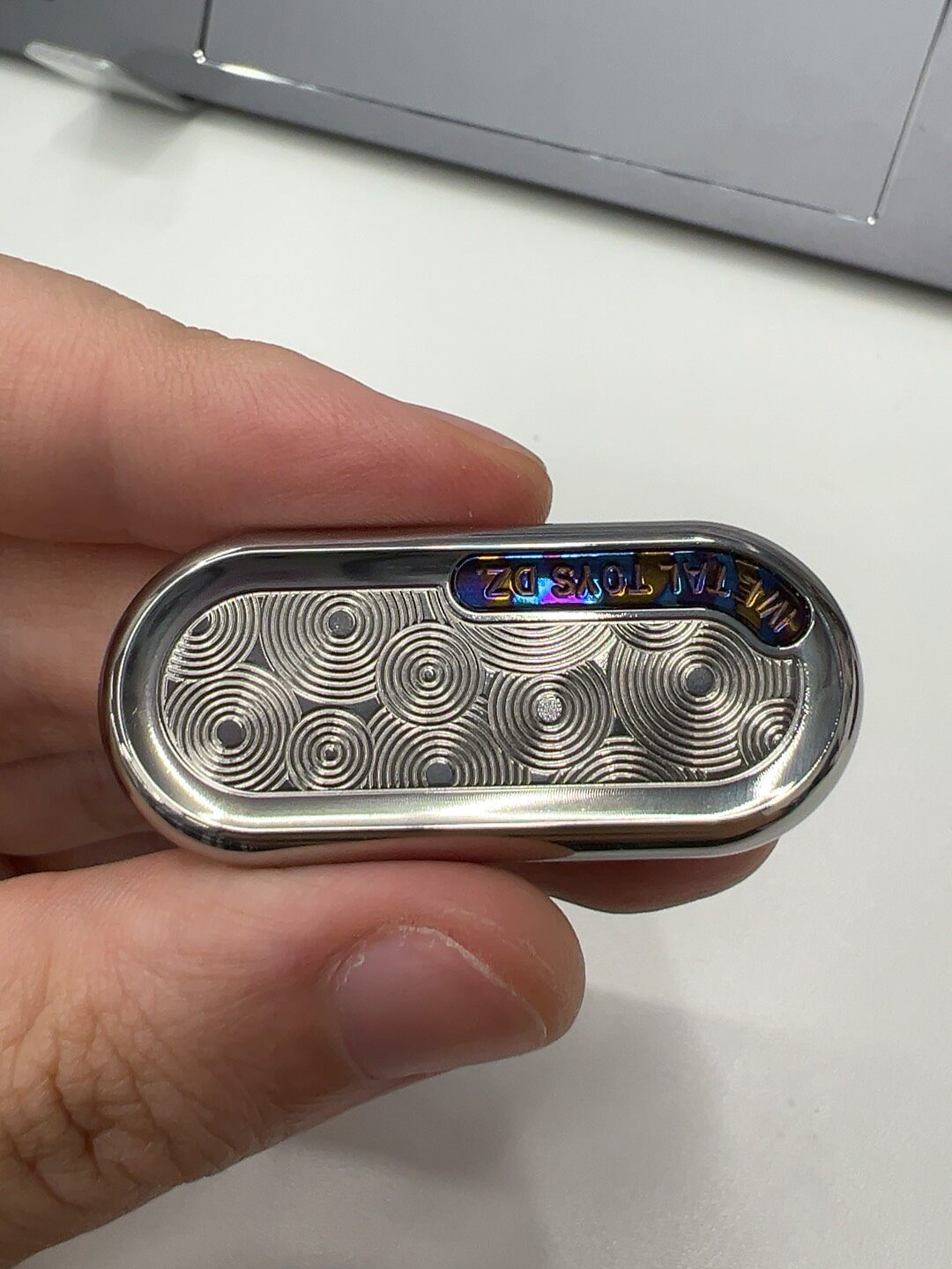 Top B, Titanium