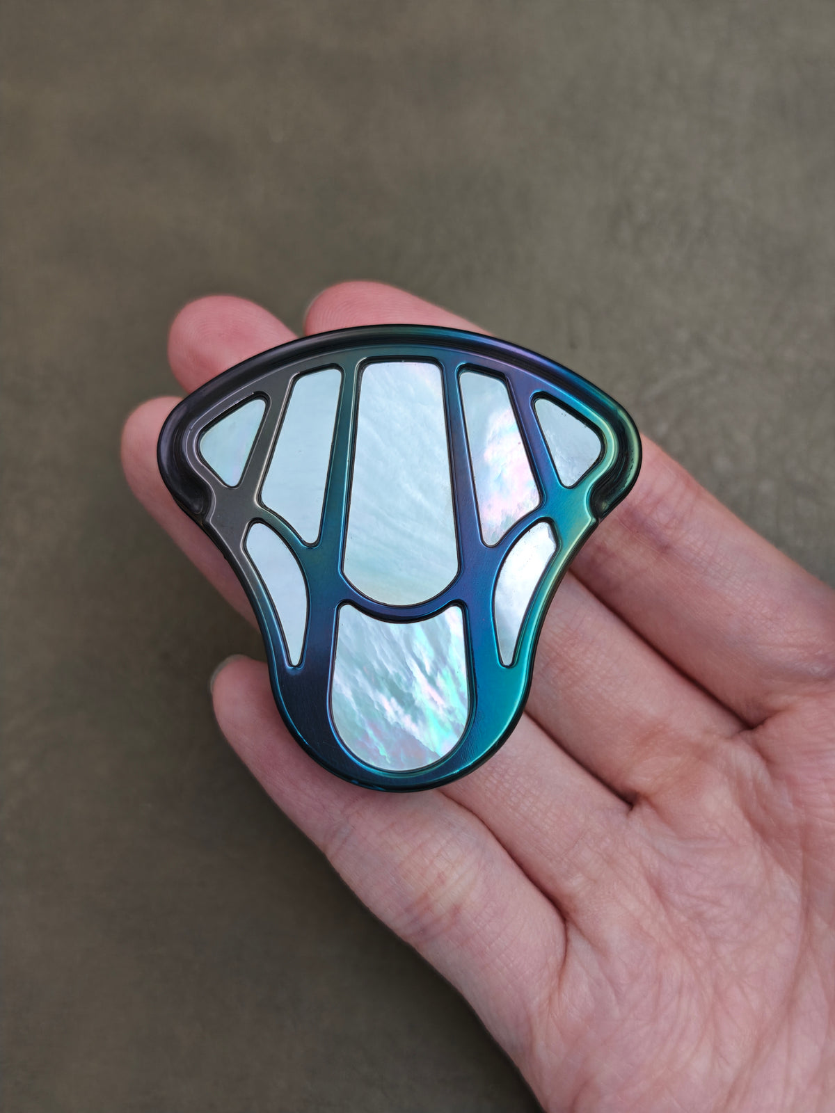Balled Shell Zirconium Oil Slick