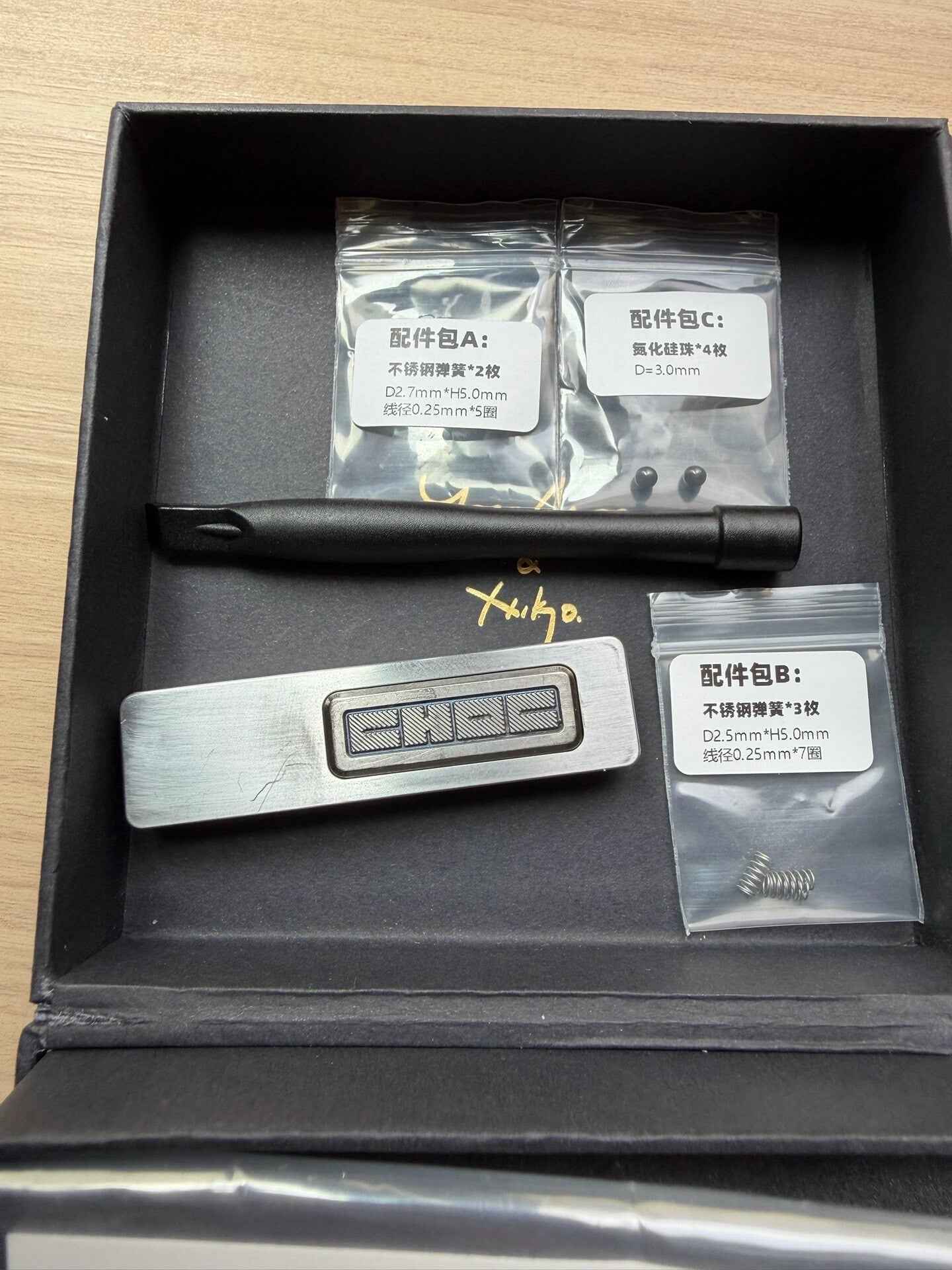 Choc Peek Stainless Steel Titanium