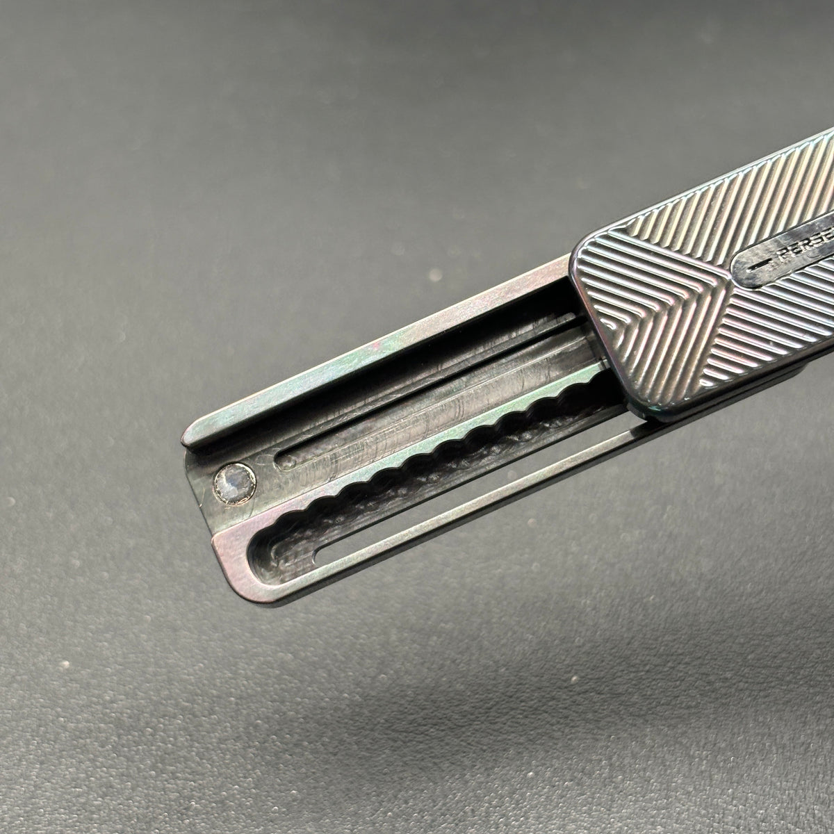 Tita Zirconium Color-Anodized Engraved Polished