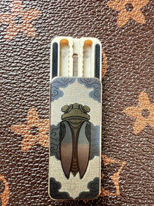 Cicada Chant Spring PEEK Titanium