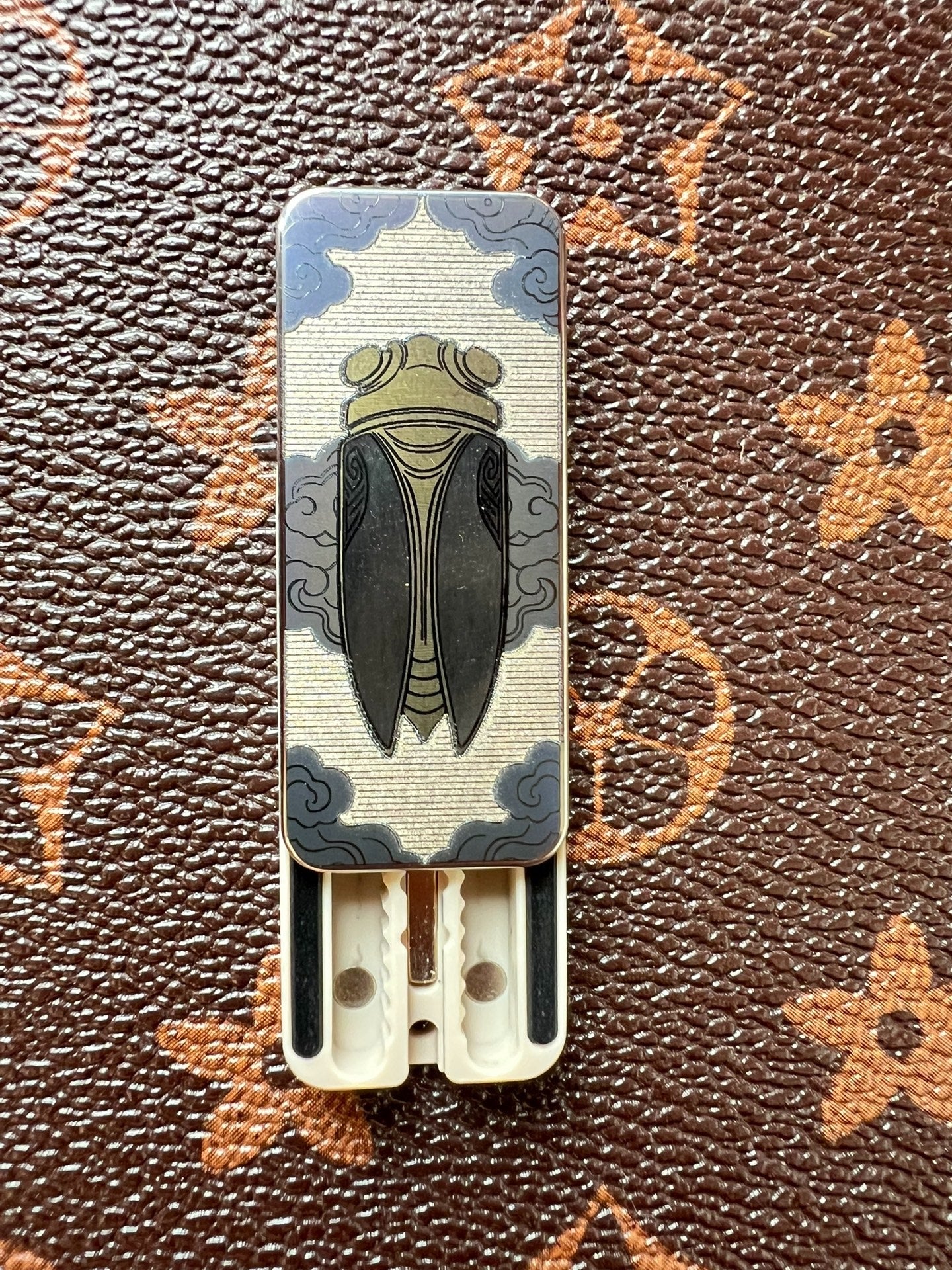Cicada Chant Spring PEEK Titanium