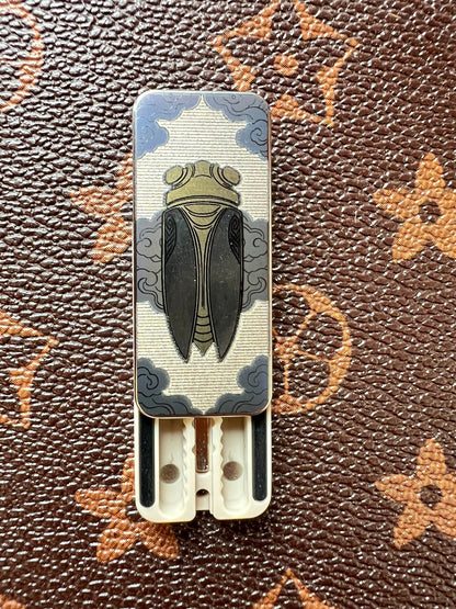 Cicada Chant Spring PEEK Titanium