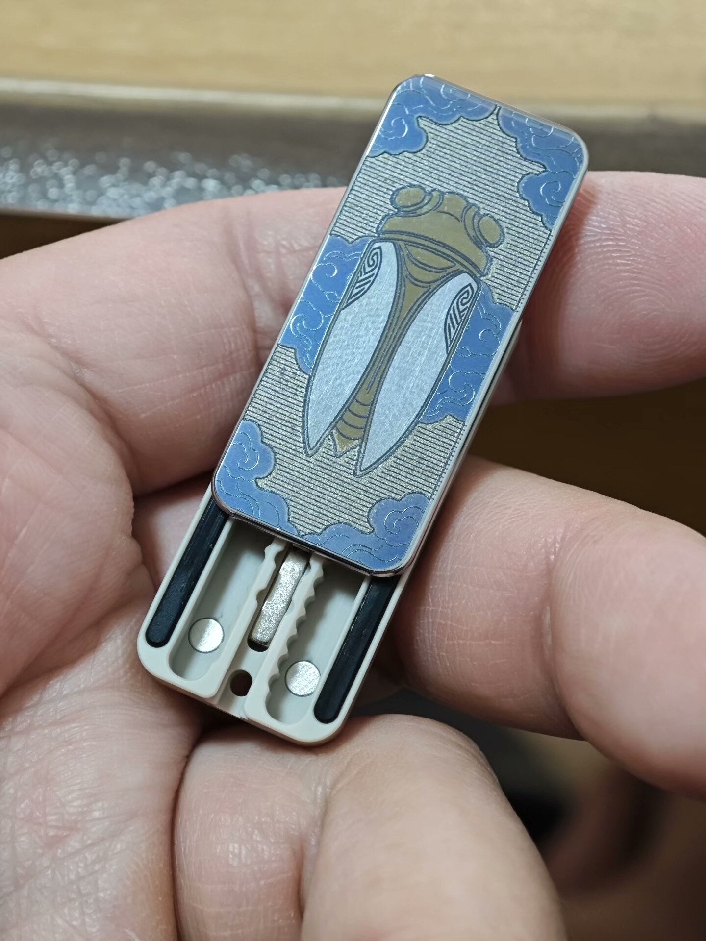 Cicada Chant Spring PEEK Titanium