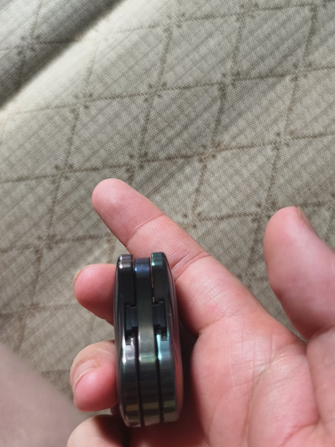 Balled Shell Mechanical Slider Oil Slick Zirconium