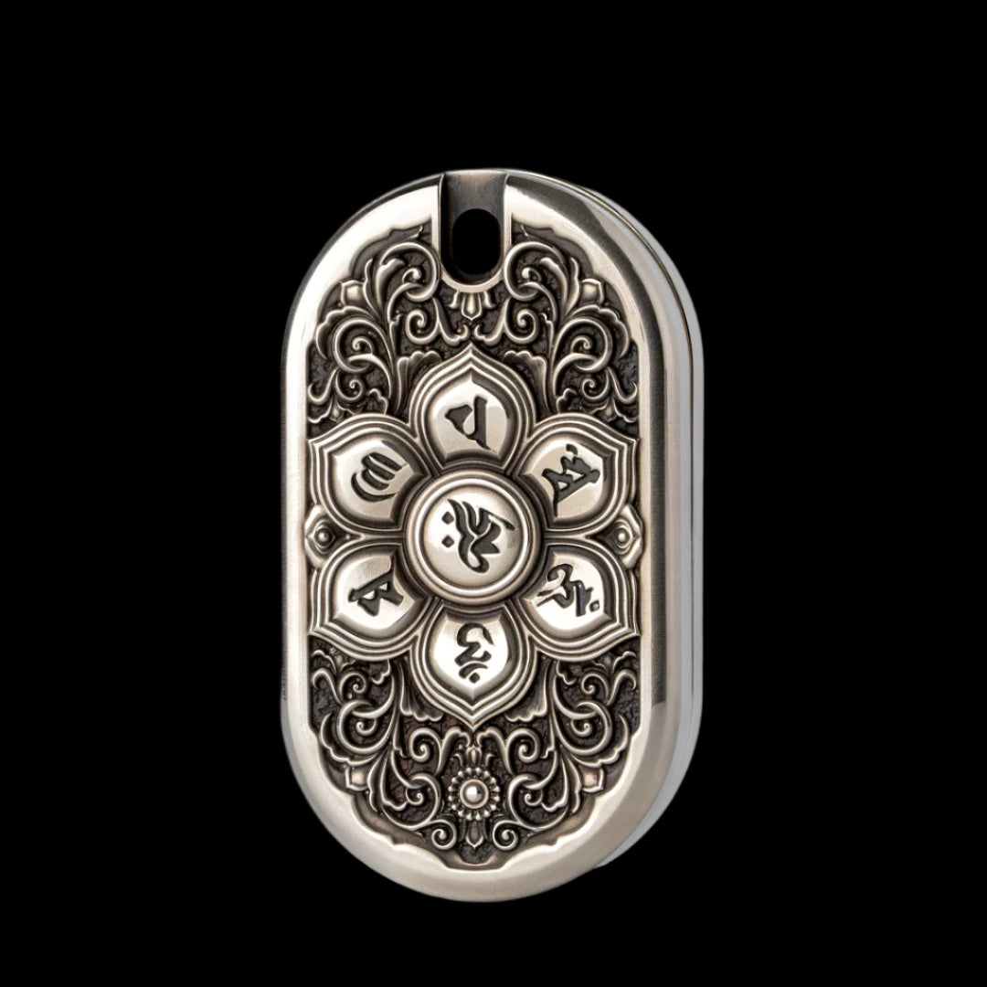 Decorative metal pendant with intricate patterns on a gray background