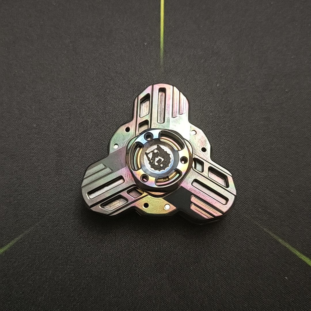 Tri linkage spinner Oil Slick Zirconium
