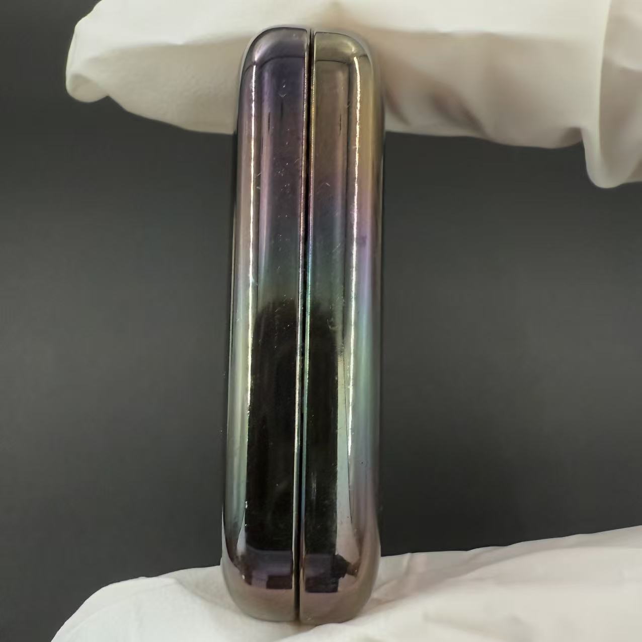 Floating Cloud Zirconium Color-Anodized Polished