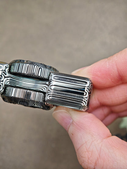 Two-Leaf Impact Damasteel