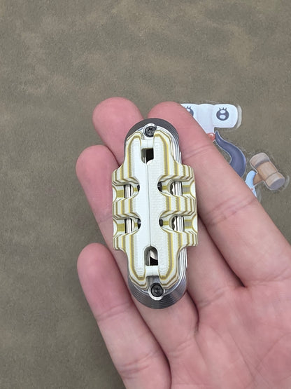 EXOSKELETON G10 Yellow Grey White Bone Core Stainless Steel