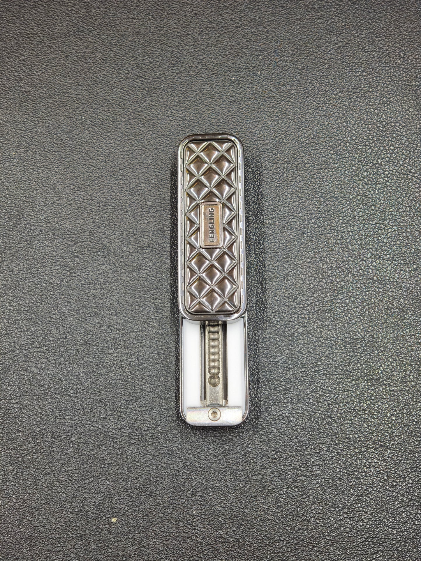 Feng Ling Zirconium Color-Anodized Polished