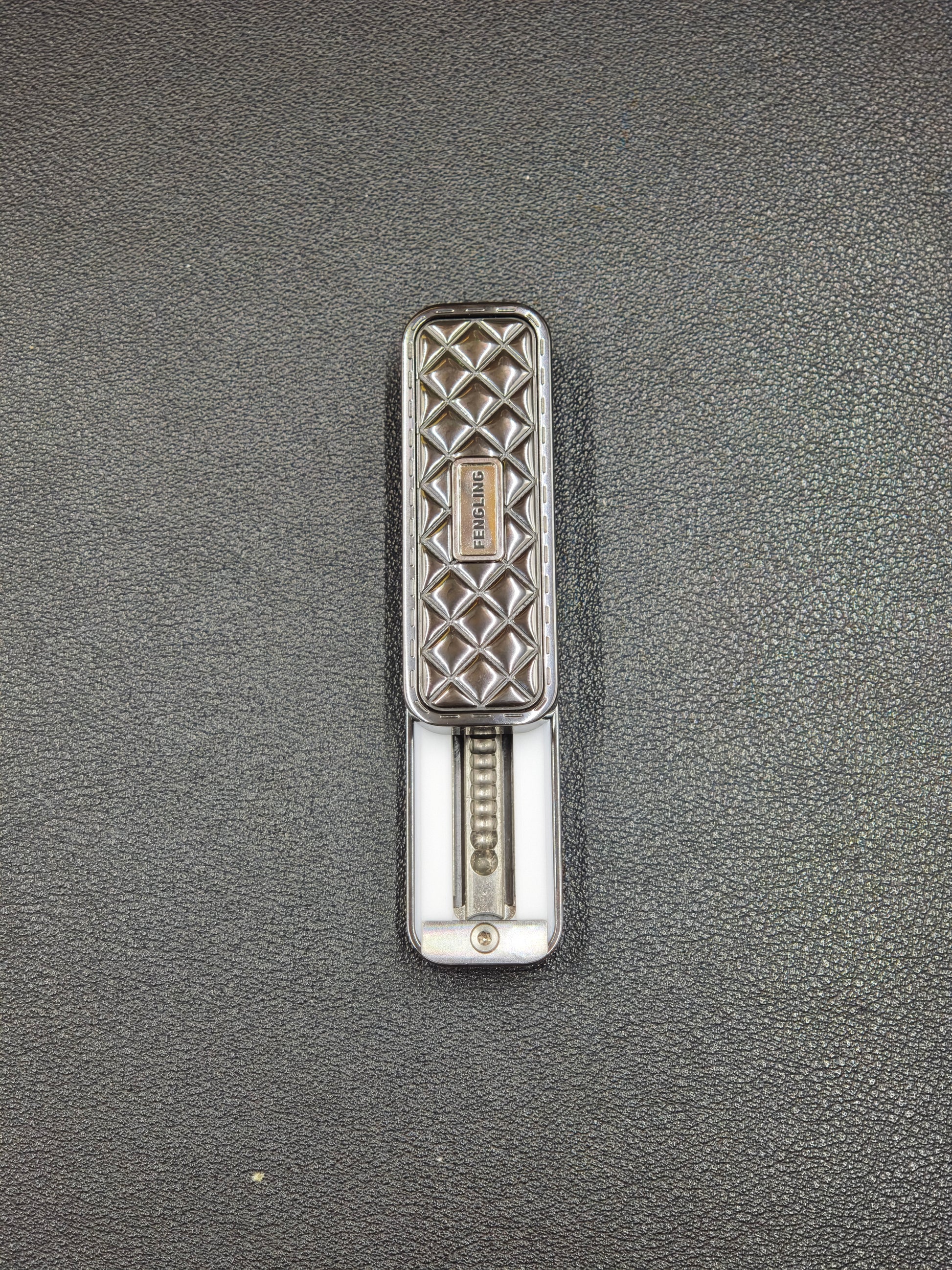 Feng Ling Zirconium Color-Anodized Polished